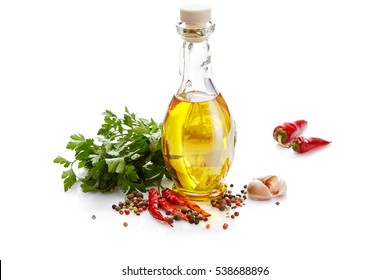 Italian Food & Drink Healthy Diet Concept: Mediterranean Spice Vegetable Herbs & Healthy Cuisine. Olive Oil Chili Pepper Cayenne Pepper Garlic  & Parsley. Isolated On White 