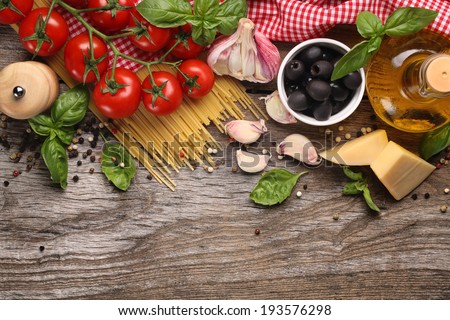 Italian food ingredients on wooden background