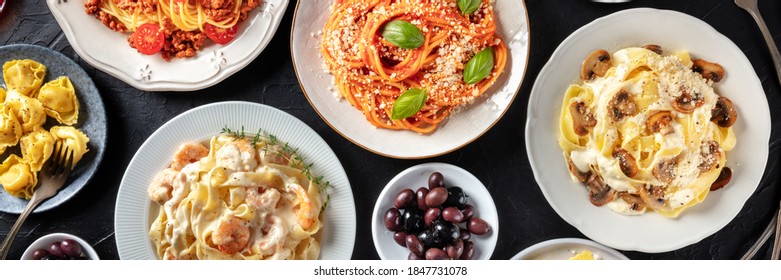 Italian Food Panorama. Various Pasta Dishes, Overhead Flat Lay Shot On A Dark Background