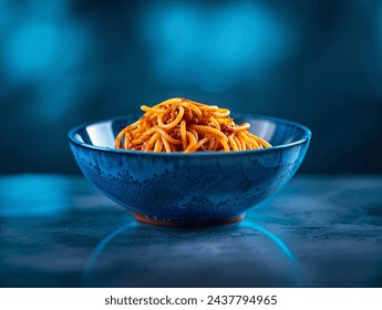 Italian food Spaghetti Bolognese in blue ceramic bowl with atmoshperic backround