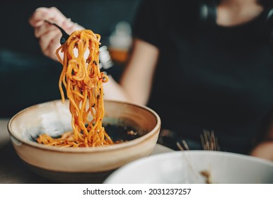 Italian Food. Woman Hand Holding Fork With Spaghetti Bolognese Sauce In Bowl