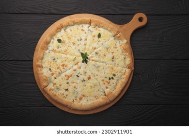 Italian or French pizza with different ingredients. Sausage, meat, cheese, tomatoes. - Powered by Shutterstock