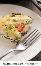Italian Frittata with slices of tomatoes. Omelette
