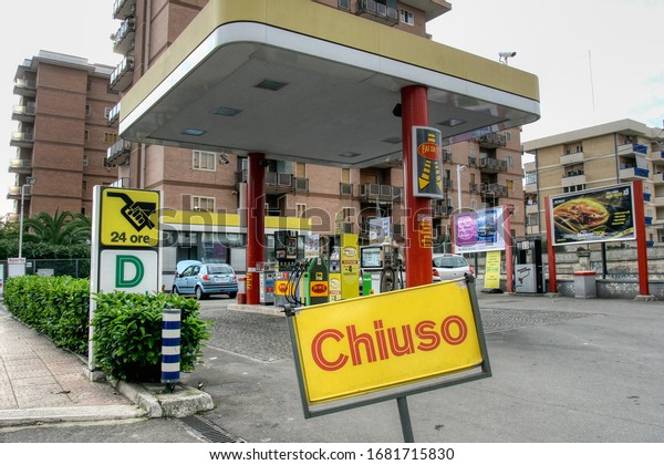 Italian gas station closed due to a strike.\
The sign in the foreground with the word \