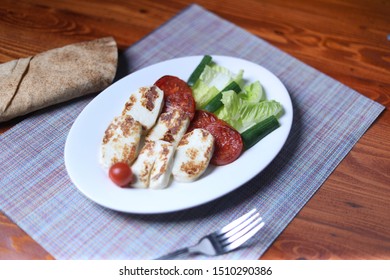 Italian Hot Entrees On Wood Table