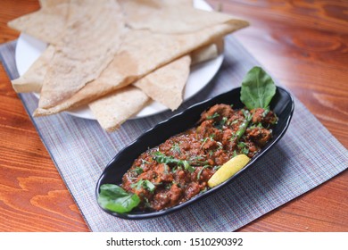 Italian Hot Entrees On Wood Table