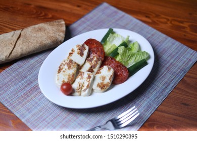 Italian Hot Entrees On Wood Table