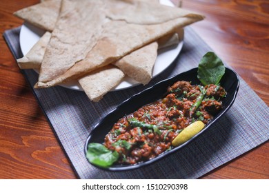 Italian Hot Entrees On Wood Table