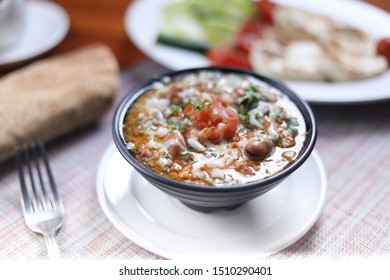 Italian Hot Entrees On Wood Table