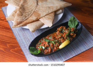 Italian Hot Entrees On Wood Table