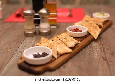 Italian Hot Entrees On Wood Table