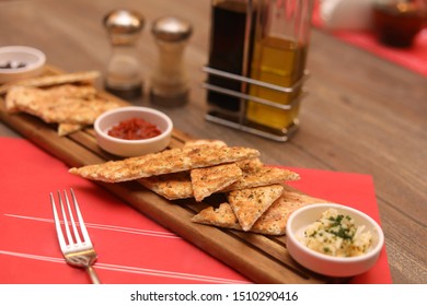 Italian Hot Entrees On Wood Table