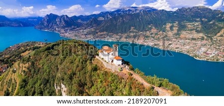 Italian lakes scenery. Amazing Iseo lake aerial view.  one of the most beautiful places - Shrine of Madonna della Ceriola in Monte Isola - scenic island in the moddle of lake. Italy travel destination