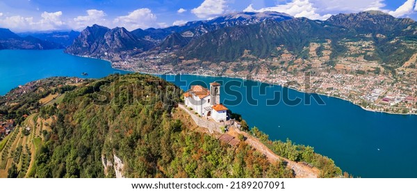 Italian lakes scenery. Amazing Iseo lake
aerial view.  one of the most beautiful places - Shrine of Madonna
della Ceriola in Monte Isola - scenic island in the moddle of lake.
Italy travel
destination