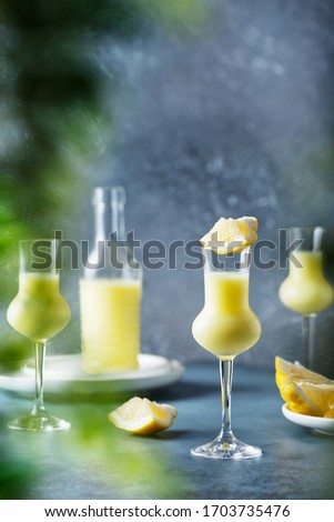 Italian liquor with lemons and cream, selective focus image