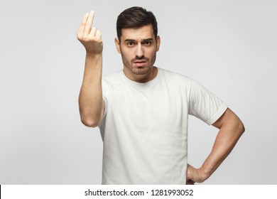 Italian man showing gesture that something is costy and he can not afford it - Shutterstock ID 1281993052