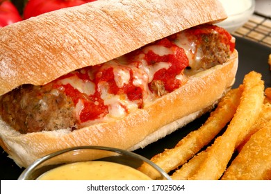 Italian Meatball Sandwich, Spicy Fries And Honey Mustard Sauce.