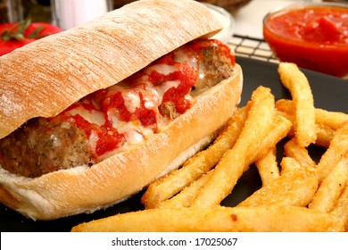 Italian Meatball Sandwich, Spicy Fries And Honey Mustard Sauce.