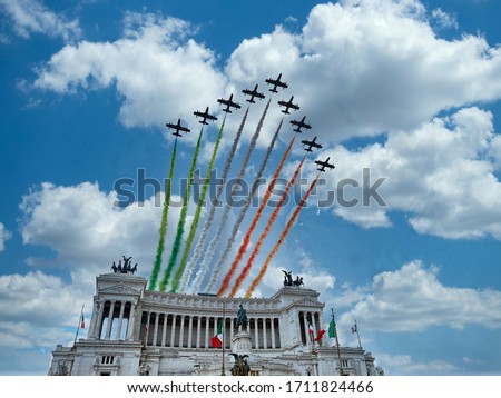Italian National Republic day Air show aerobatic team frecce tricolore flying over altare della patria in Rome, Italy