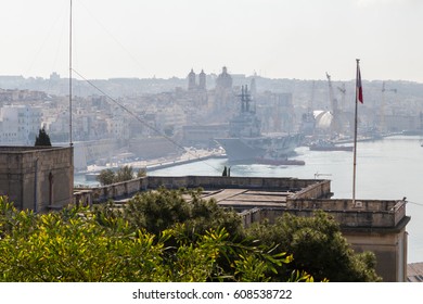 Italian Navy Aircraft Carrier Giuseppe Garibaldi 551, Docked In Harbor, Morning Haze, Grand Harbour, Valletta, Malta, March 2017