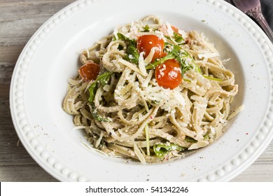 Italian Pasta With Cheese, Tomatoes And Arugula