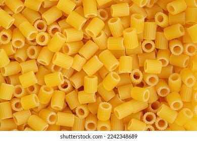Italian pasta ditali rigati background. Top view, close up. - Shutterstock ID 2242348689