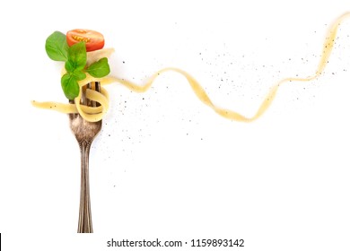 Italian Pasta. An Overhead Photo Of A Vintage Fork With Pappardelle, Basil, Cheese, Tomato, And Pepper, On A White Background With Copyspace