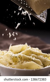 Italian Pasta Penne With Grated Parmesan Cheese