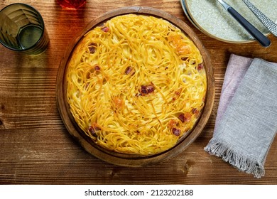 Italian Pasta Spaghetti Frittata On Rustic Table