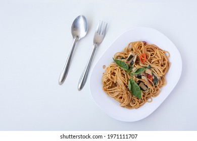 Italian Pasta Spaghetti, Tomato Sauce, Cheese And Basil [On A White Background, Overhead With A Copy Area.