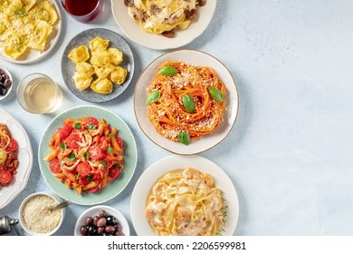 Italian Pasta, Various Dishes, Overhead Flat Lay Shot With Copy Space. Spaghetti With Tomato Sauce, Seafood Pasta, Penne With Chicken Etc, With Wine