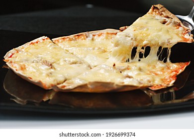 Italian Pizza Tortilla With Grated Mozzarella