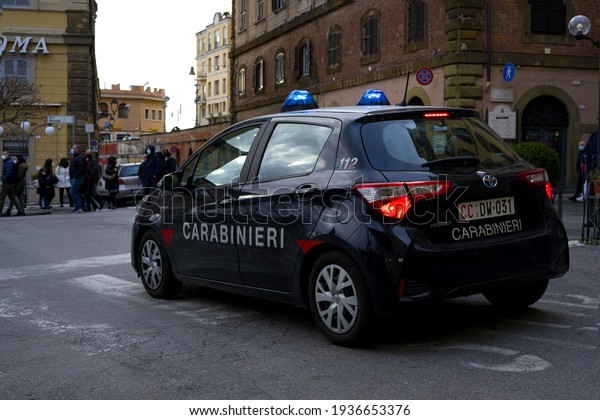 Italian police controlling people in quarantine:\
Frascati, Italy, March 14,\
2021