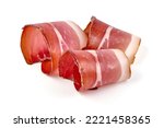 Italian prosciutto crudo or spanish jamon. Jerked meat, isolated on white background