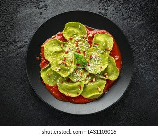 Italian ravioli pasta stuffed with basil pesto, creamy ricotta and crunchy pine nuts. Healthy Vegetarian food - Powered by Shutterstock