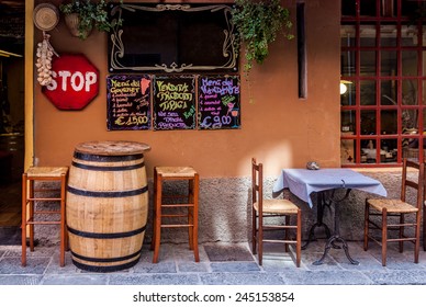 Italian Restaurant With Wine Barrel, Table And Chairs, Near Genoa, Italy