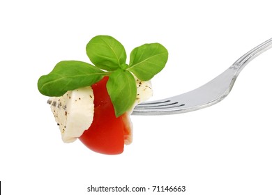 Italian Salad On A Fork On White Background