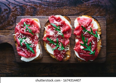 Italian sandwiches with mozzarella and beef carpaccio top view