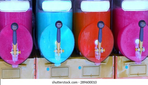 Italian Shave Ice Machine With Many Colored Flavors And Iced At The Bar