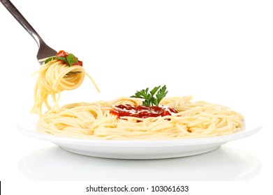 Italian Spagetti Cooked In A White Plate With Fork On White Background Close-up