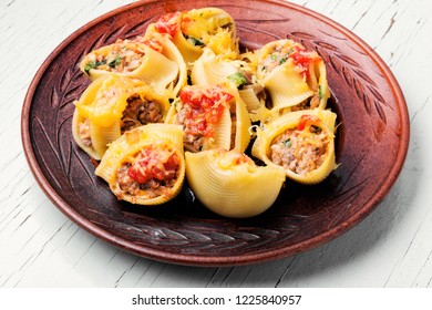 Italian style stuffed pasta shells with meat.Italian cuisine