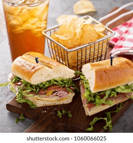 Italian Sub Sandwich With Salami, Ham And Chips With Copy Space