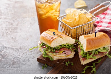 Italian Sub Sandwich With Salami, Ham And Chips With Copy Space