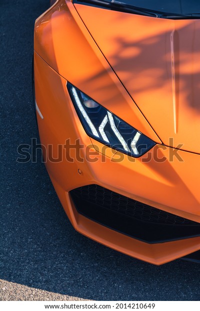Italian supercar Lamborghini Huracan\
headlights. Super car wallpaper. Kyiv, Ukraine - July\
2021.