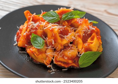 Italian tortellini pasta with tomato sauce - Italian food style - Powered by Shutterstock