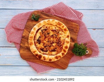Italian Traditional Bak Kwa Pizza on wood table top view