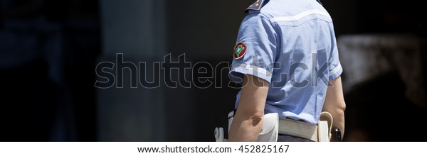 Italian
traffic officer working outdoor in the
traffic