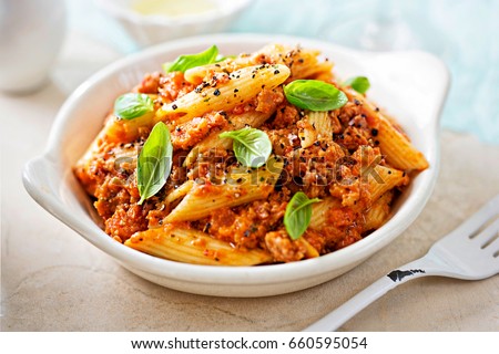 Italian tuscan sausage penne in tomato sauce with basil 