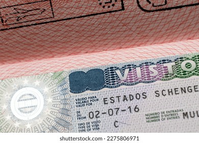 Italian visa stamp in a travel passport, Italy Schengen visa, immigrant, work and travel documents, emigration, immigration, tourism concept - Shutterstock ID 2275806971