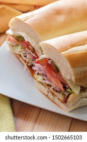 Italian-American Chicken Fried Steak Sandwich Hogie With Shredded Lettuce Tomato Hot Peppers And Red Onion